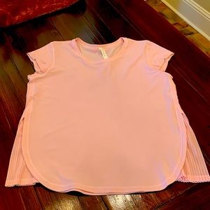 Lululemon size 10 baby pink shirt with pleated on the side super cute